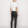 DRYKORN SLICK - Trousers - Black