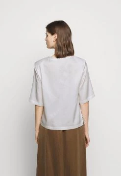 DRYKORN JUDIKA - Blouse - Ecru -Trend Code Shop ca2c9c9ab418486b98d95e00c9b06514