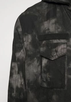 DRYKORN CUCAMO - Parka - Mottled Olive -Trend Code Shop e10dc73284af403b8e6499fe194e35b5